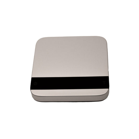 Square beige device with a black band on a white background